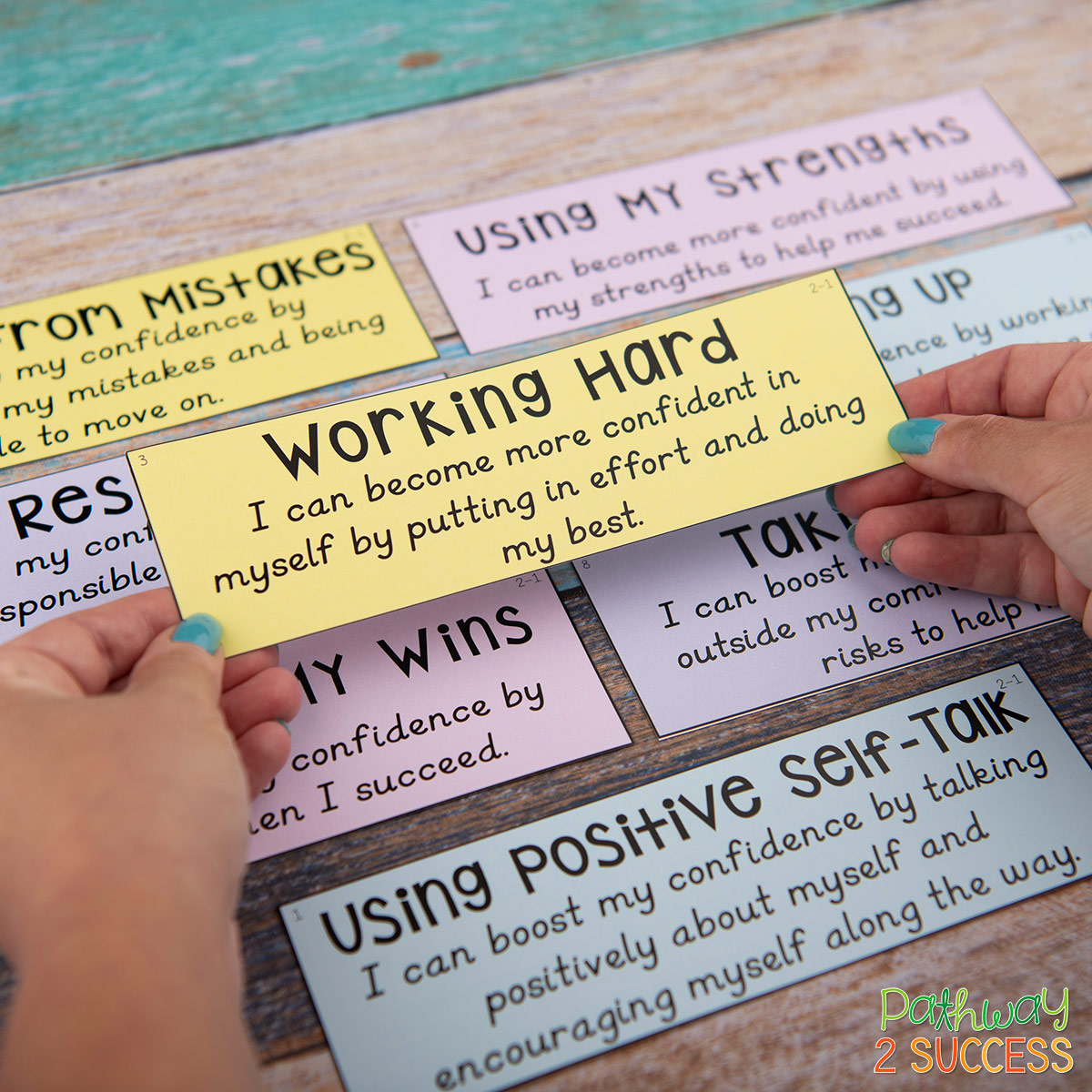 Teaching kids to be more self-aware can help them develop confidence, understand emotions, and work towards individual goals. Teachers can use these strategies and printable activities to help kids develop self-awareness and focus on social emotional learning. #sel #socialemotionallearning #pathway2success