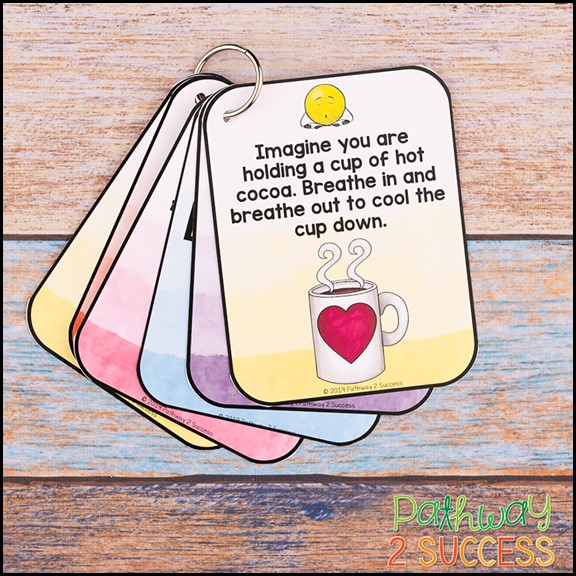 Mindful breathing cards on a ring. Card reads: Imagine you are holding a cup of hot cocoa. Breathe in and breathe out to cool the cup down.