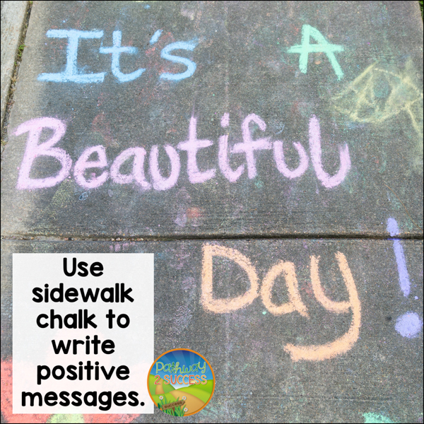 Use sidewalk chalk to write positive messages